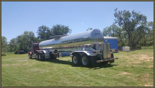 Semi Tanker Truck Delivering Bulk Sugar Syrup For Commercial Bee Feeding